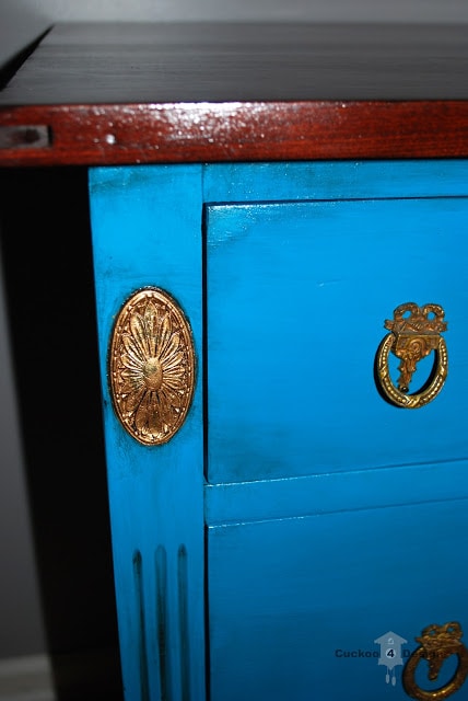 turquoise dresser and gold details