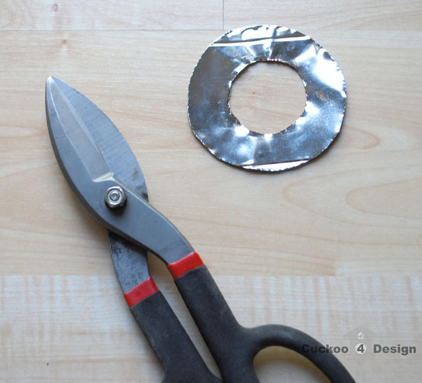 tin snips and cut out ring for DIY crystal vanity light