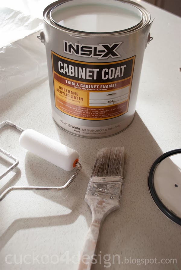 a can of white INSL-X Cabinet Coat Trim & Cabinet Enamel