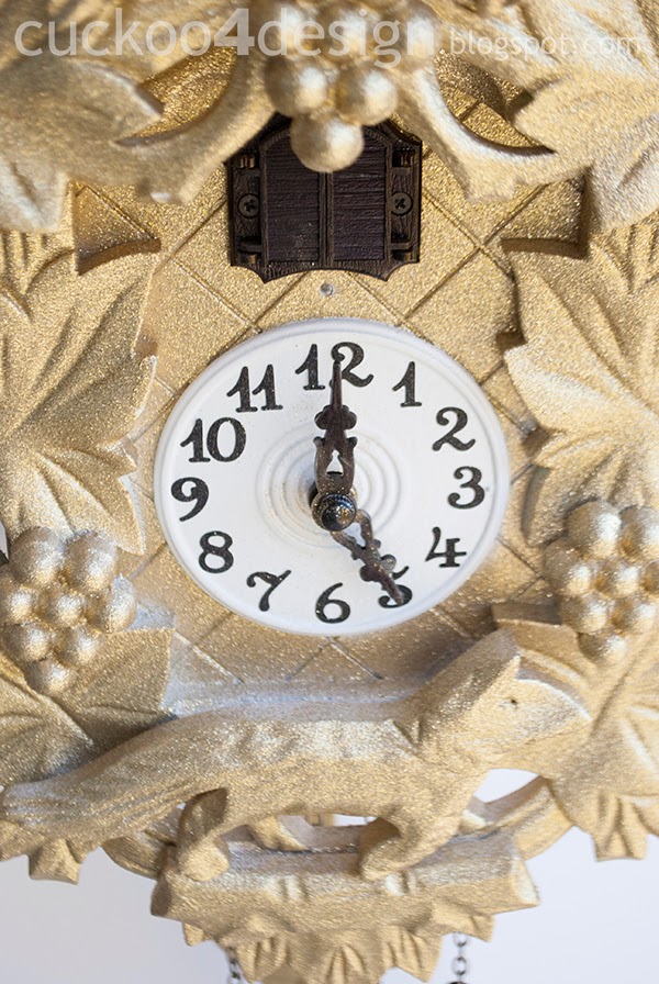 close-up of sparkly gold cuckoo clock