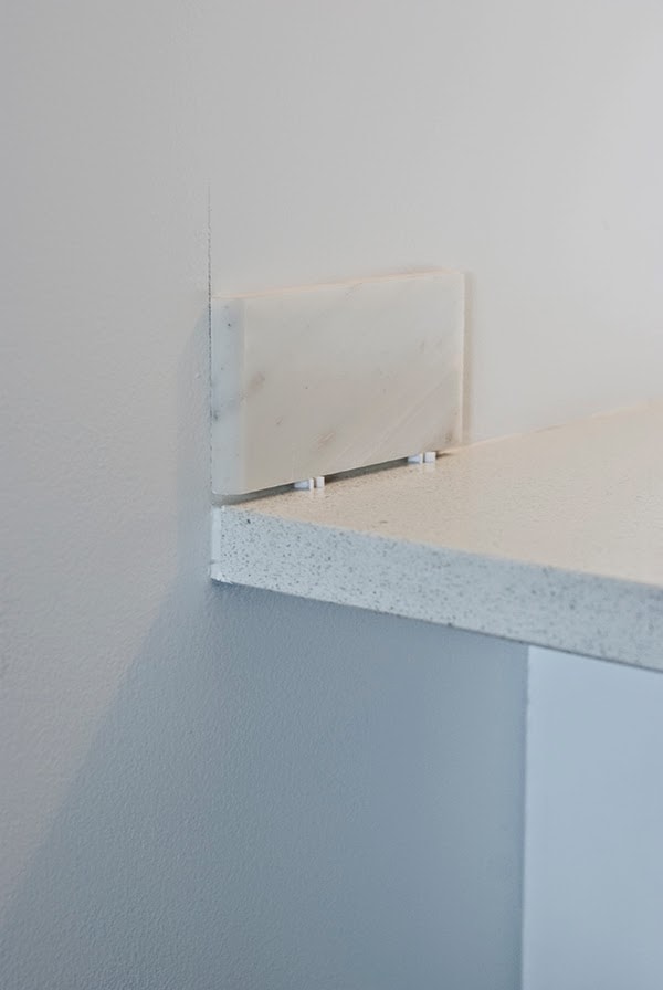 1/8-inch tile spacer between countertop and subway tile