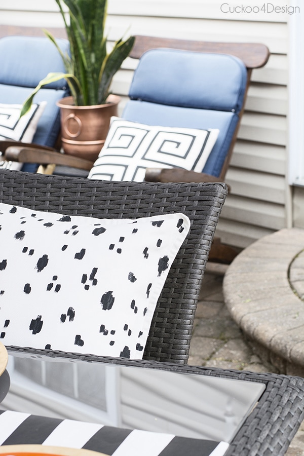 black and white DIY pillows on patio chairs
