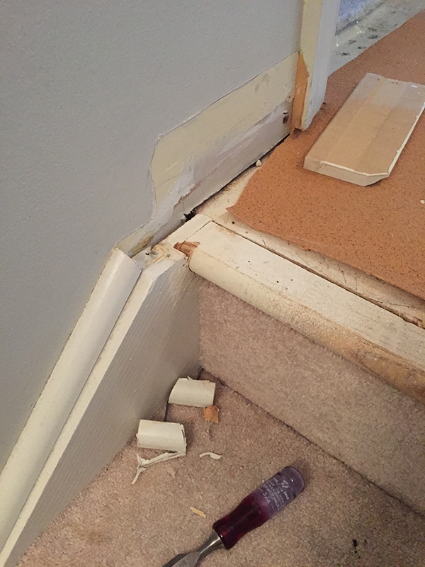view of molding situation at the top of the stairs after removing carpet
