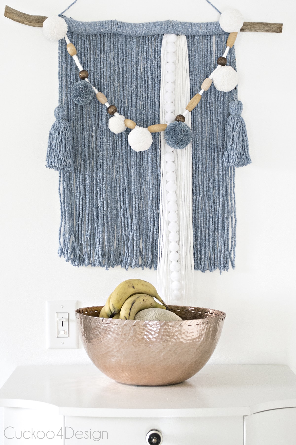 mop head yarn wall hanging with beads and pom poms