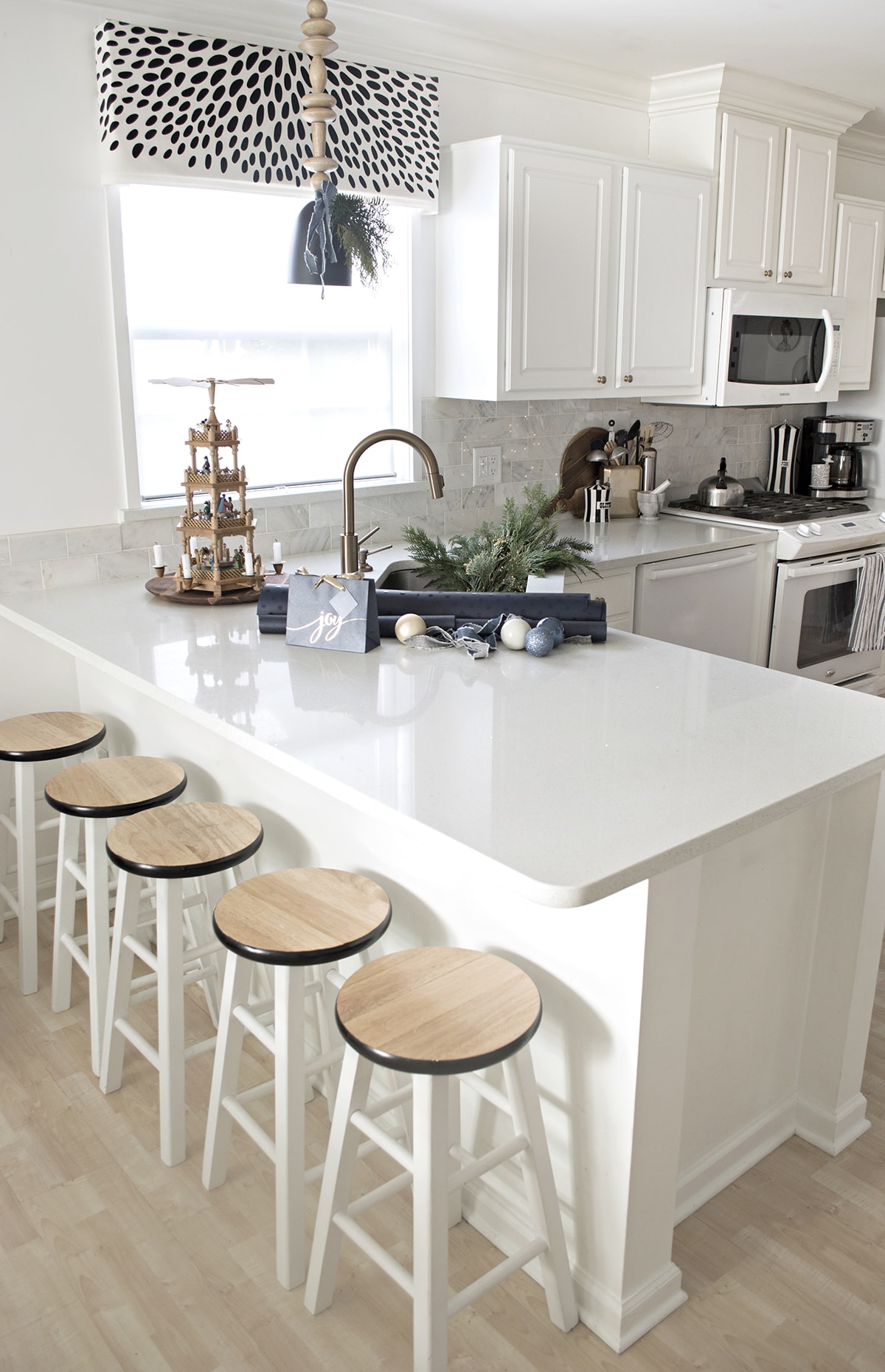 white Christmas kitchen with blue jeans accents