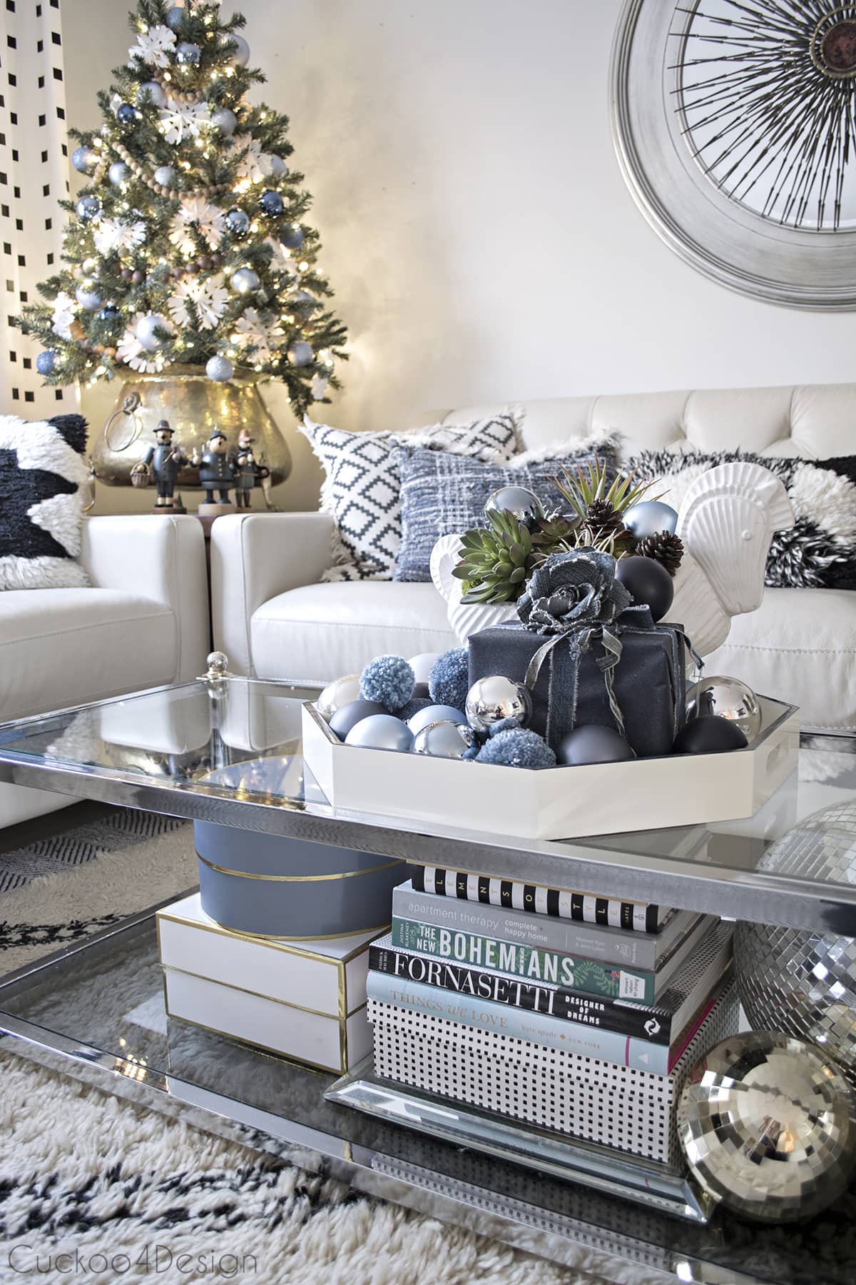 Blue, black and white eclectic Christmas living room  with jeans accessories