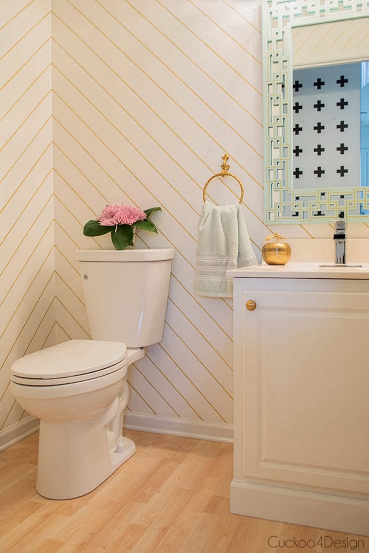 view of full powder room with new vanity kick plate