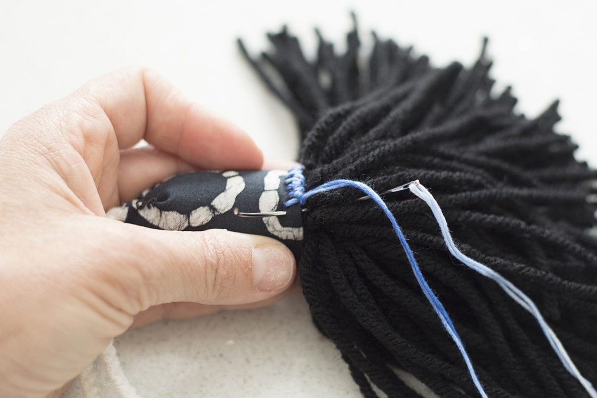 yarn stitched detail on yarn tassel