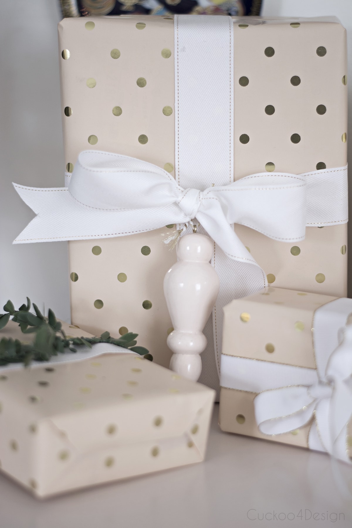 gifts with Blush wrapping paper with gold pole dots