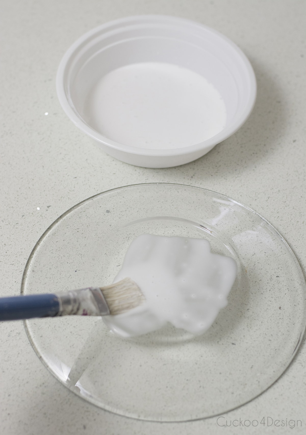 applying a thin coat of mod podge to your clear glass plate