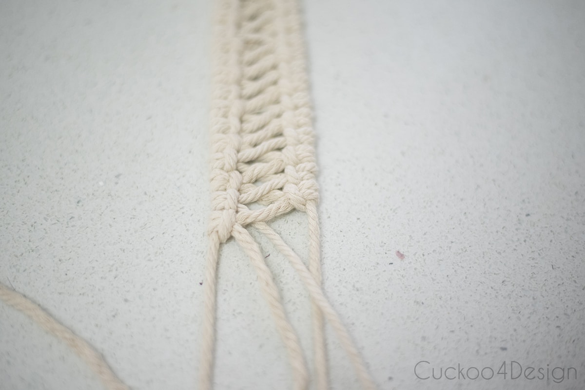 a band of vertical double half hitch knots to make macrame jewelry pendant