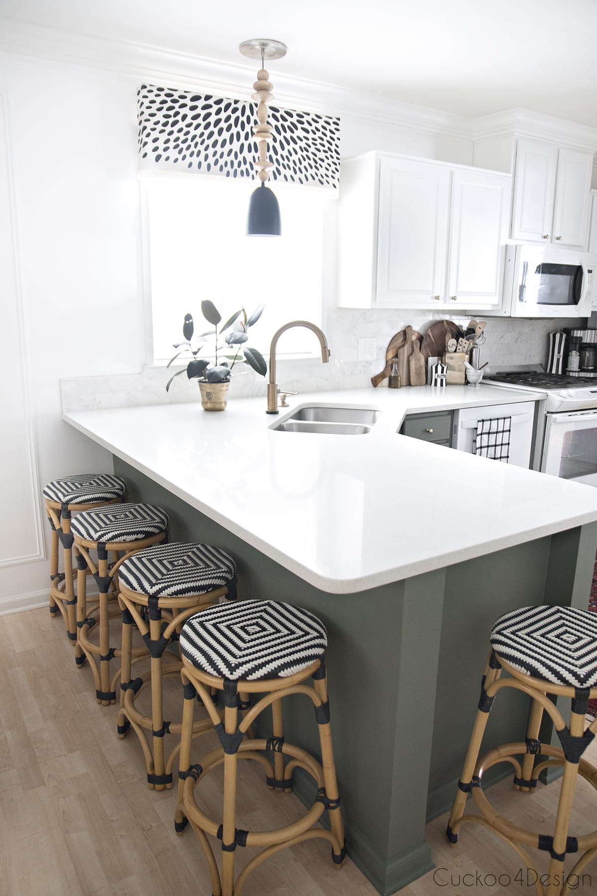 From white laminate kitchen to a green and white two-toned kitchen