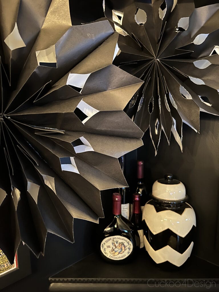 black and white paper bag snowflakes in our bar area