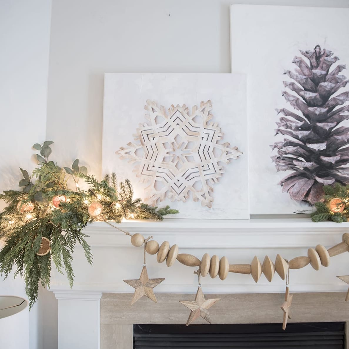 snowflake and pinecone DIY Christmas canvas paintings