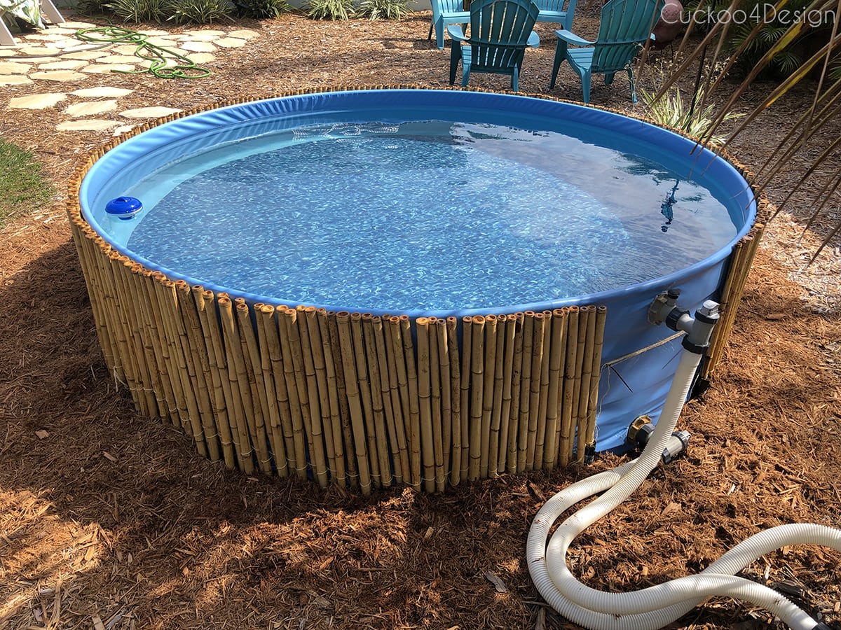 view of stock tank pool with pool liner from behind