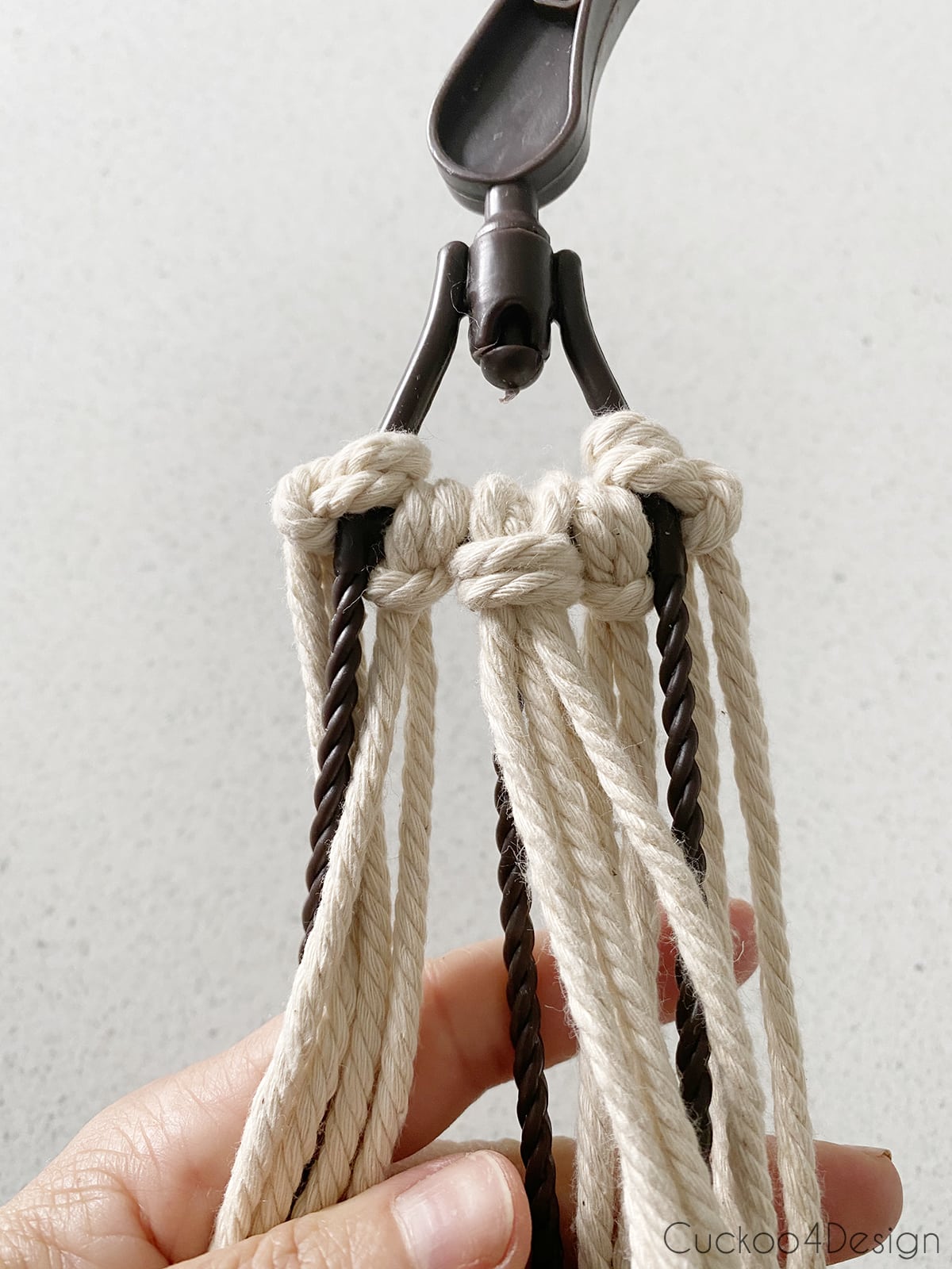 front view of Lark's Head knots on plastic hook