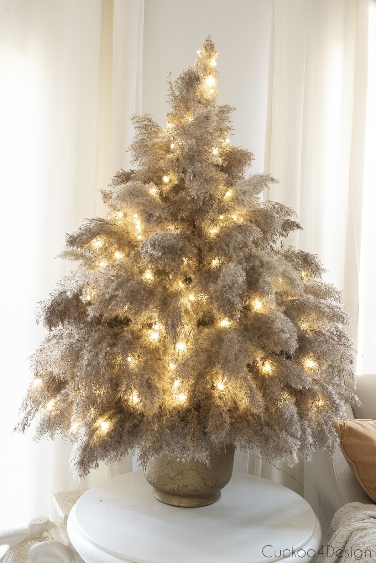 finished DIY pampas grass Christmas tree with fairy lights