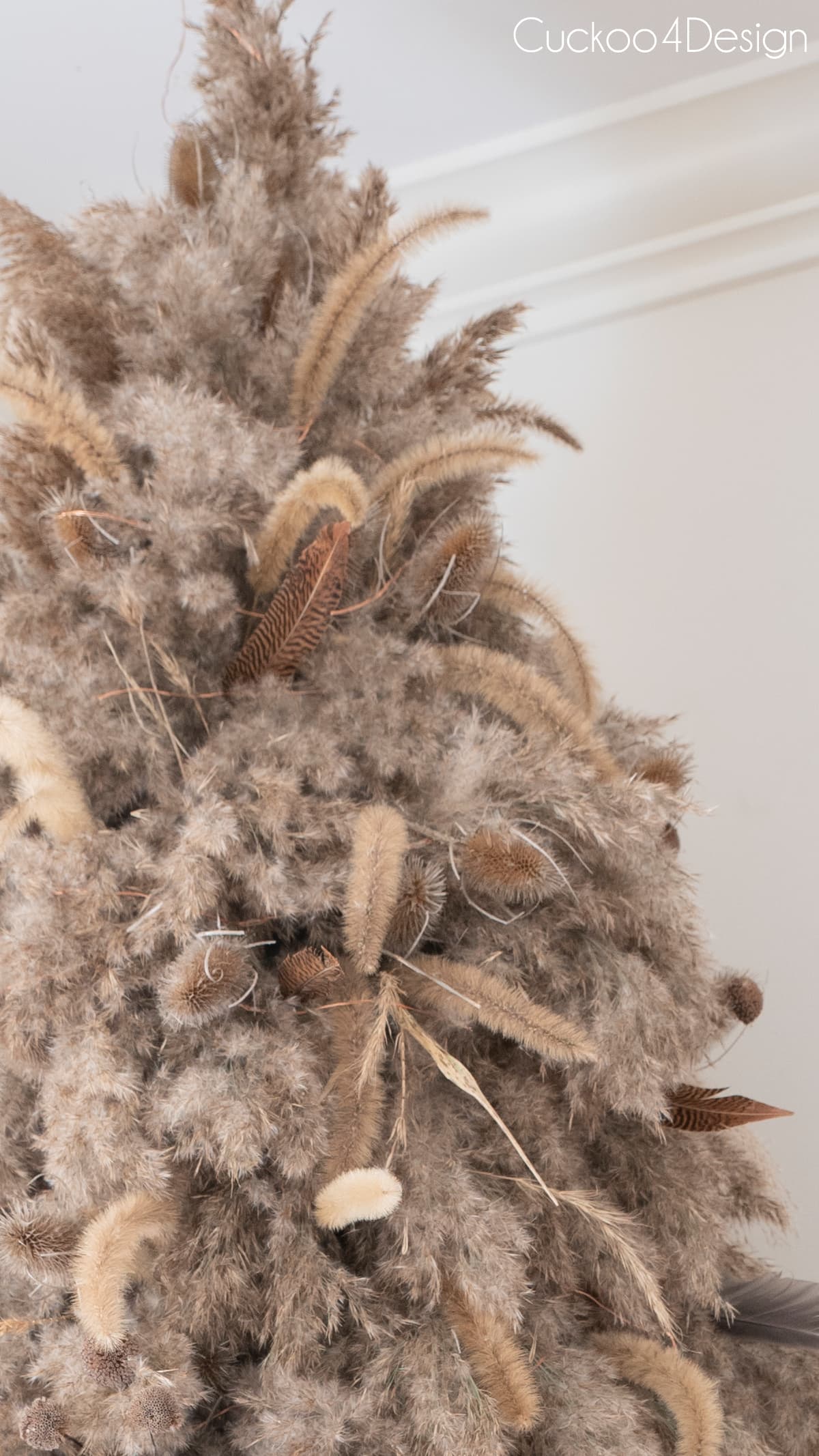 closeup of the top of dried floral Christmas tree