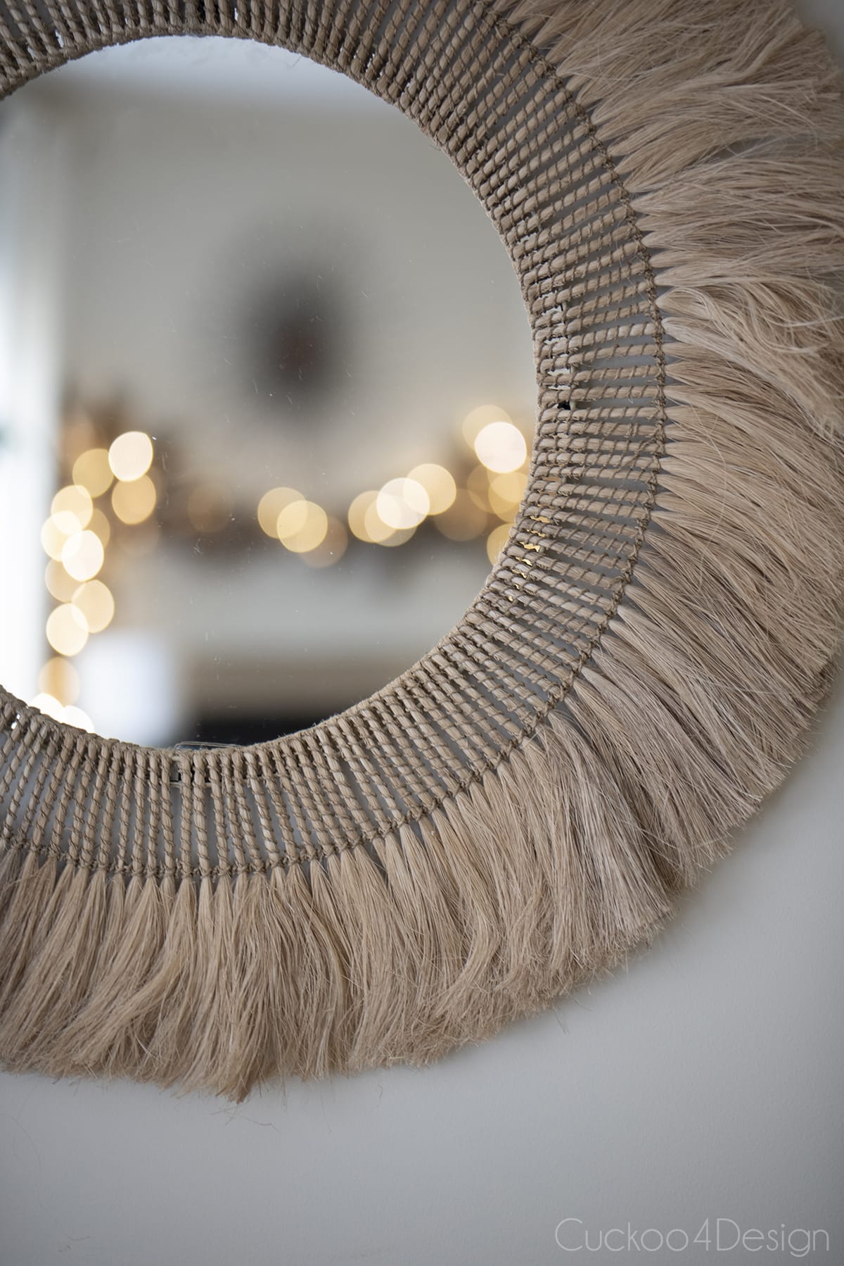 close-up of boho yarn fringe mirror