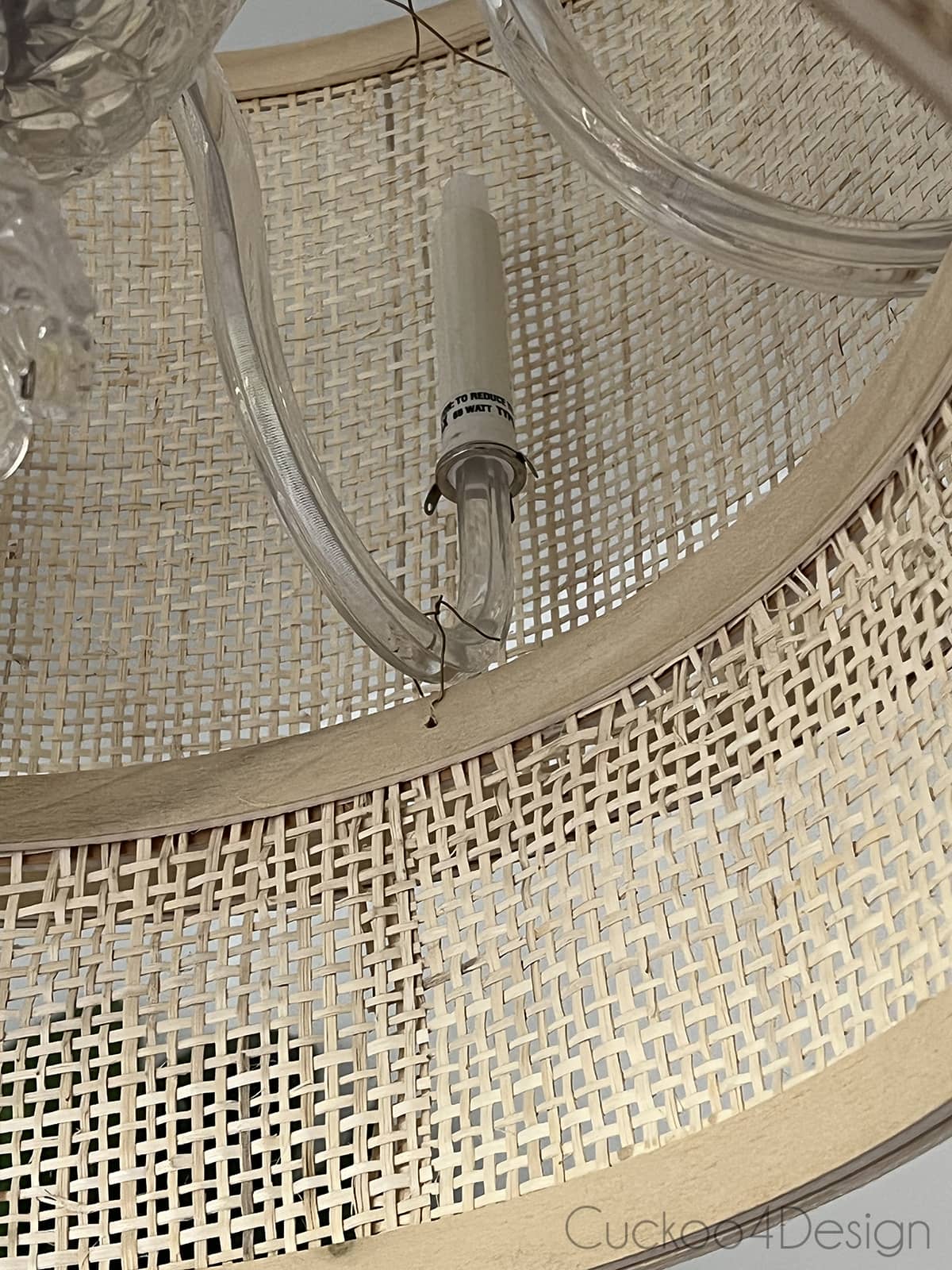 using metal wire to hang DIY drum shades to cover chandelier