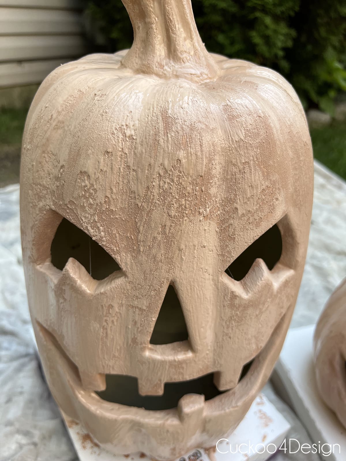 close up texture on painted terracotta pumpkin
