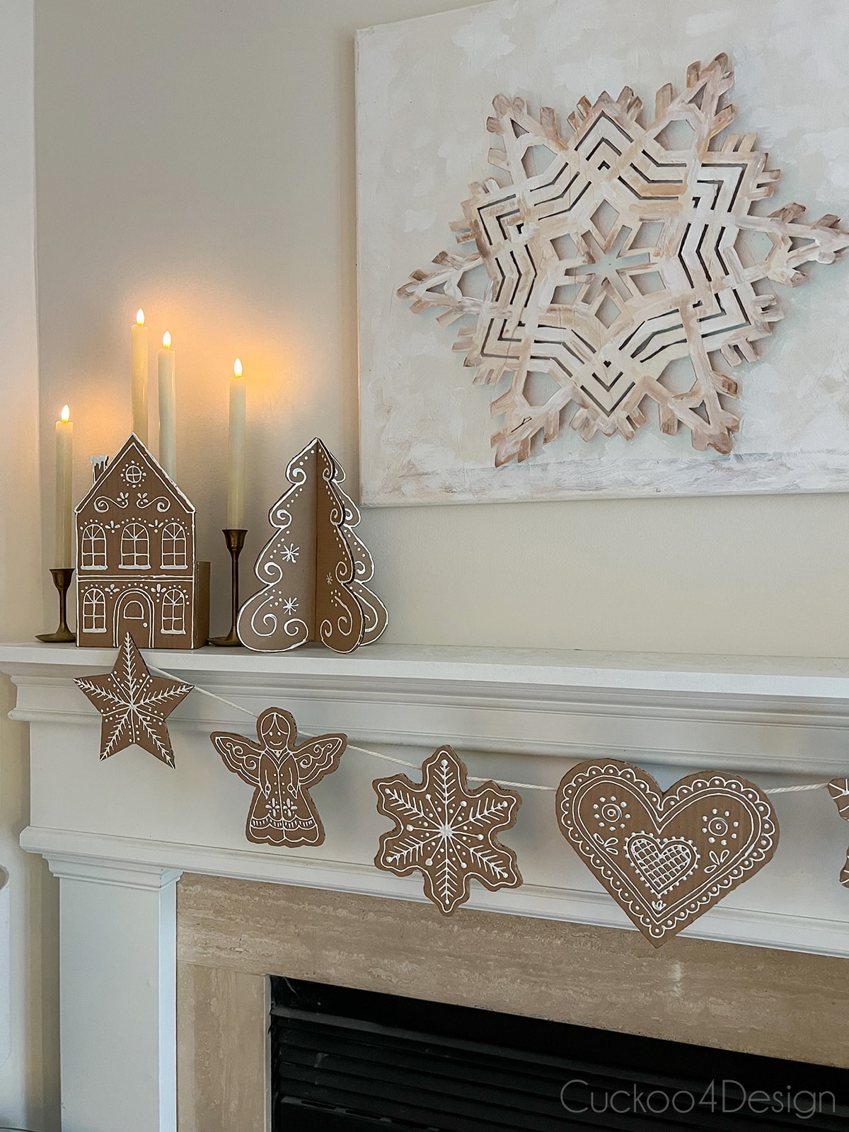 gingerbread Christmas ornaments hanging on fireplace mantle
