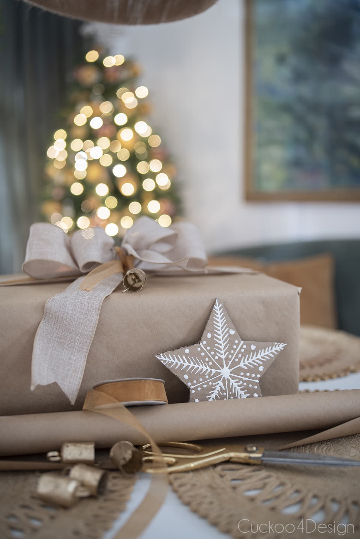 brown paper wrapped Christmas present on dining room table