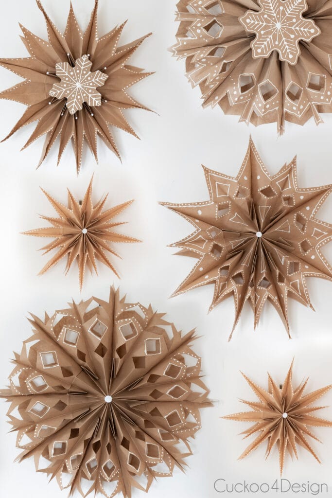 paper bag snowflakes with gingerbread embelishments