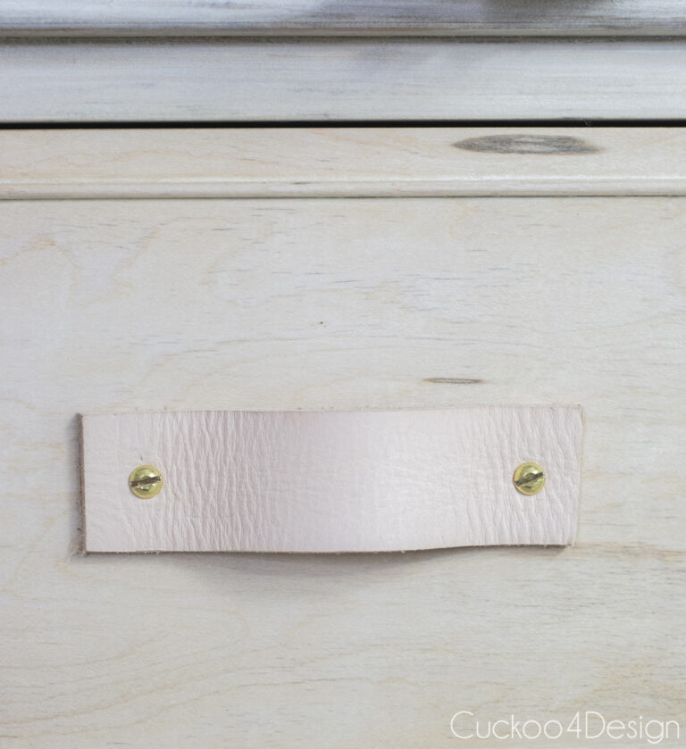 close-up of leather drawer pull
