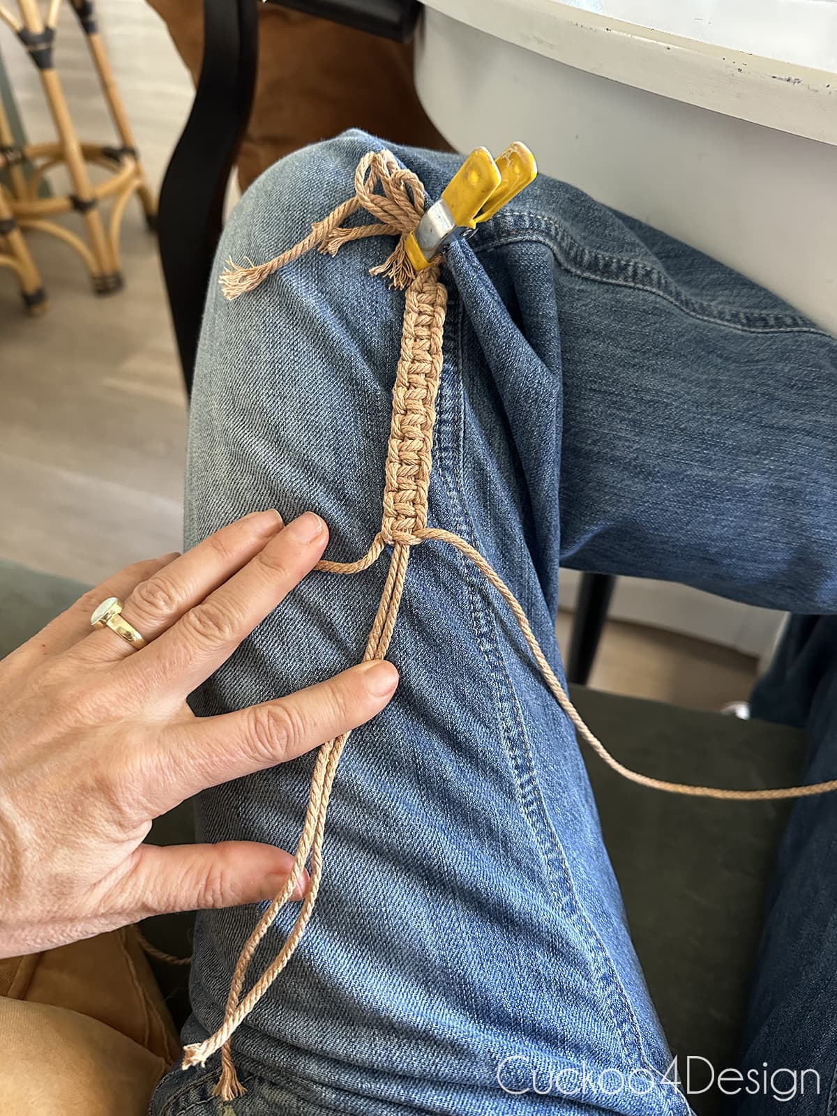 clipping yarn to pants to knot Square Knot strands