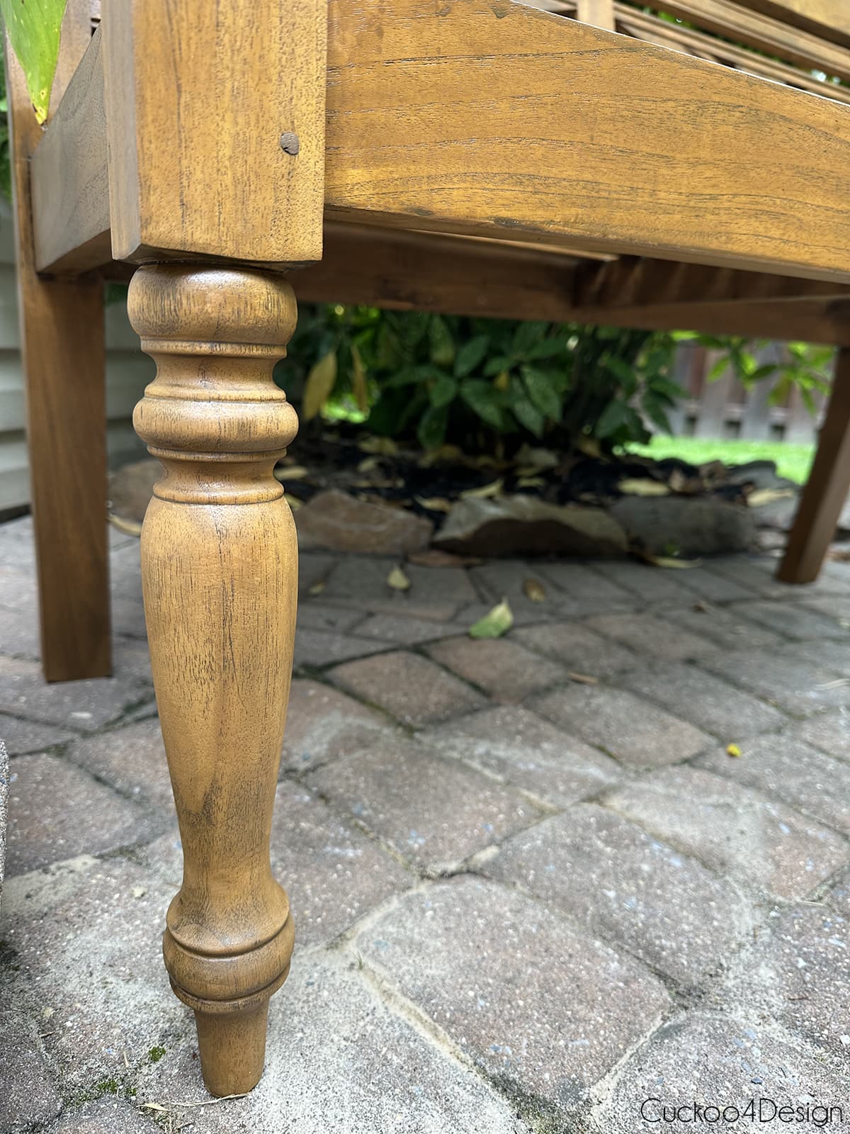 close-up of refinished spindle legs on bench
