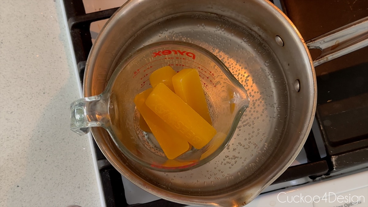 melting wax on stove in hot water bath