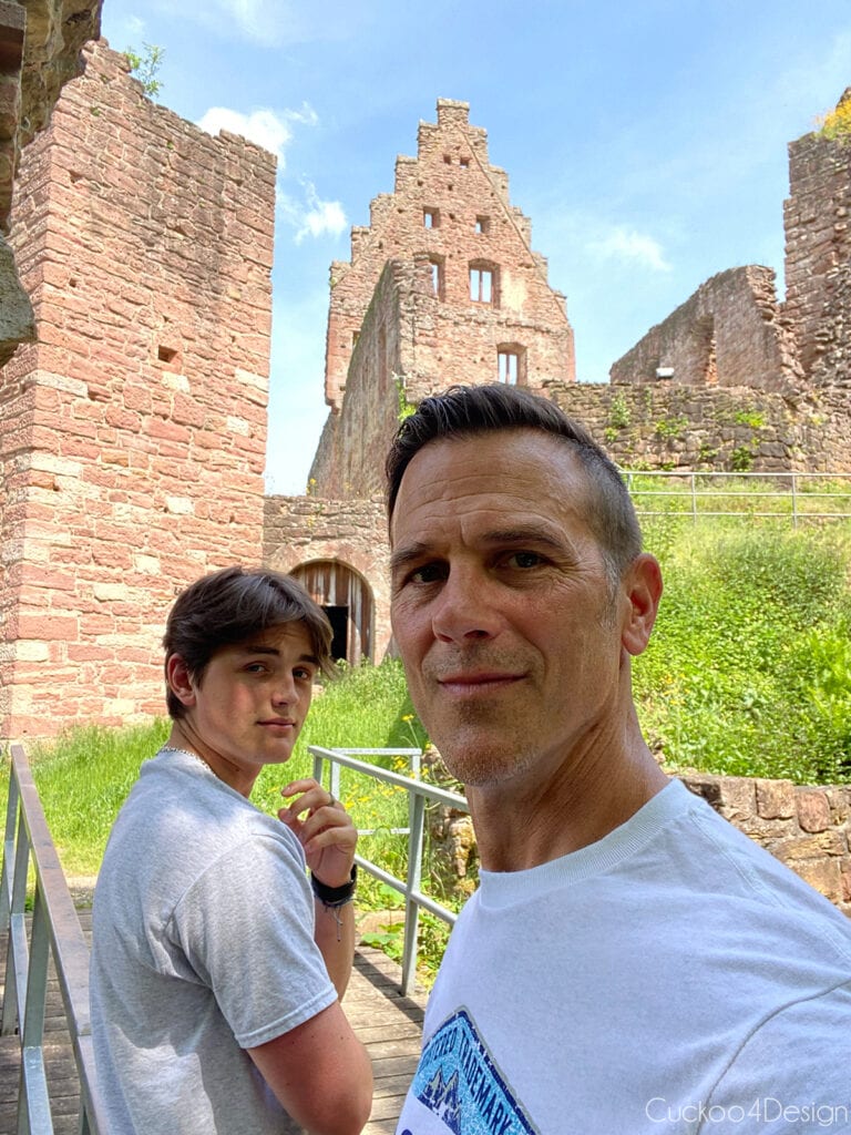 in front of castle ruins