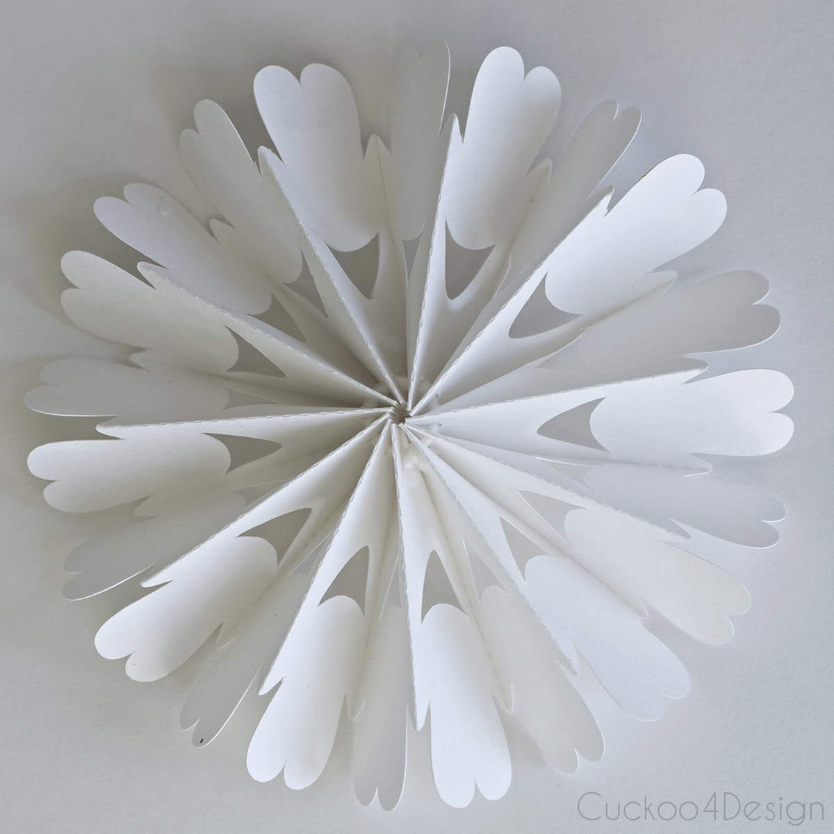 finished poster board snowflake made from free snowflake svg file
