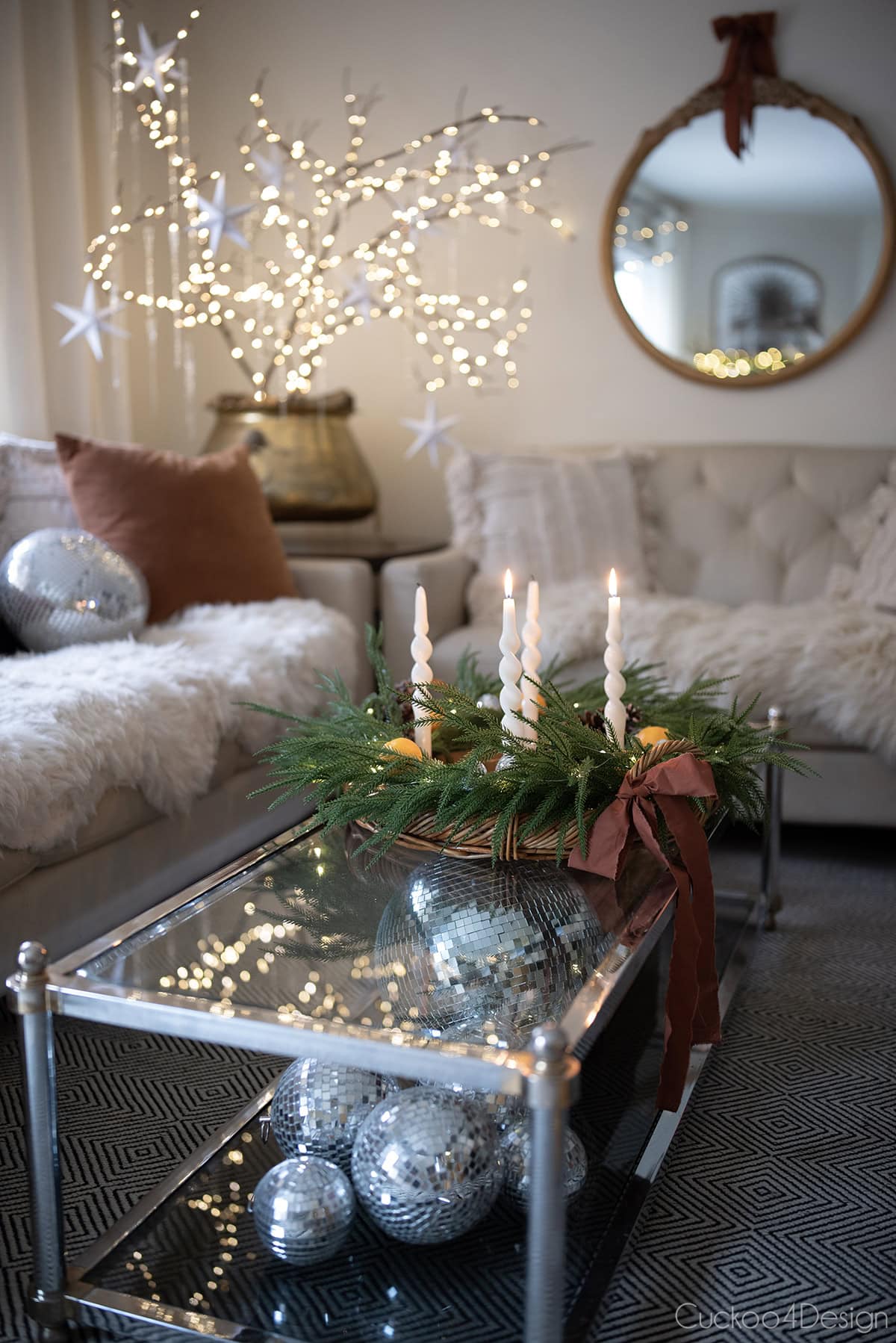 living room view with lit branches in the background