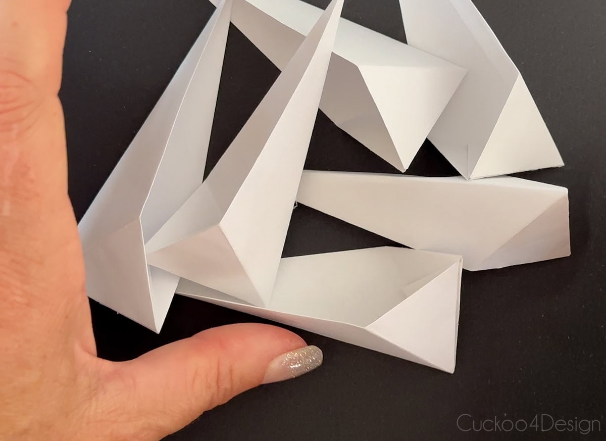 six folded and glued star point shapes