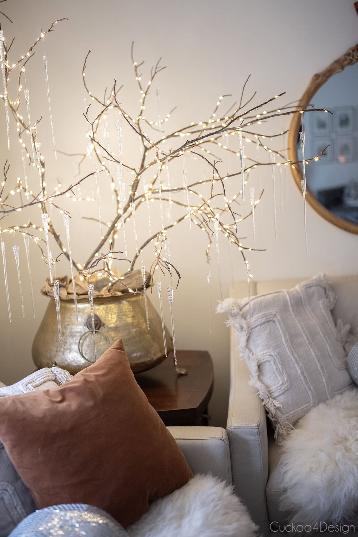 front view of icicle branches with fairy lights as winter decor