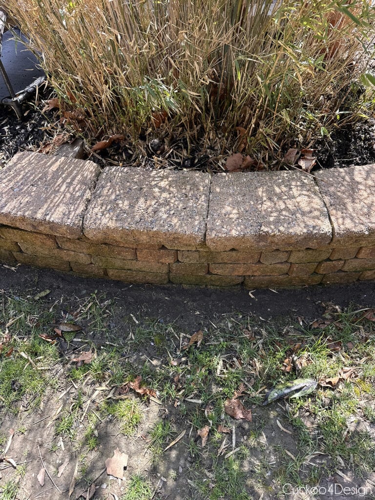 leaning patio retaining wall