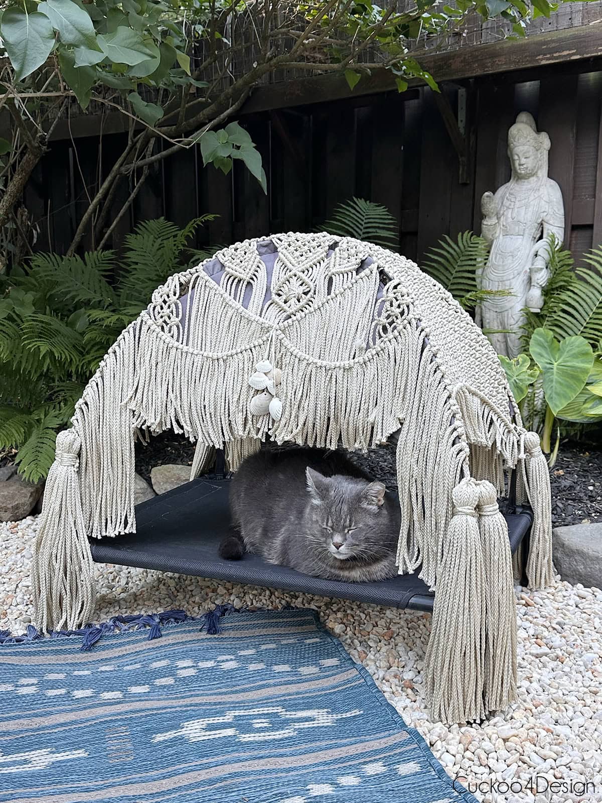 outdoor shade tent for pets with a macrame roof and seashells