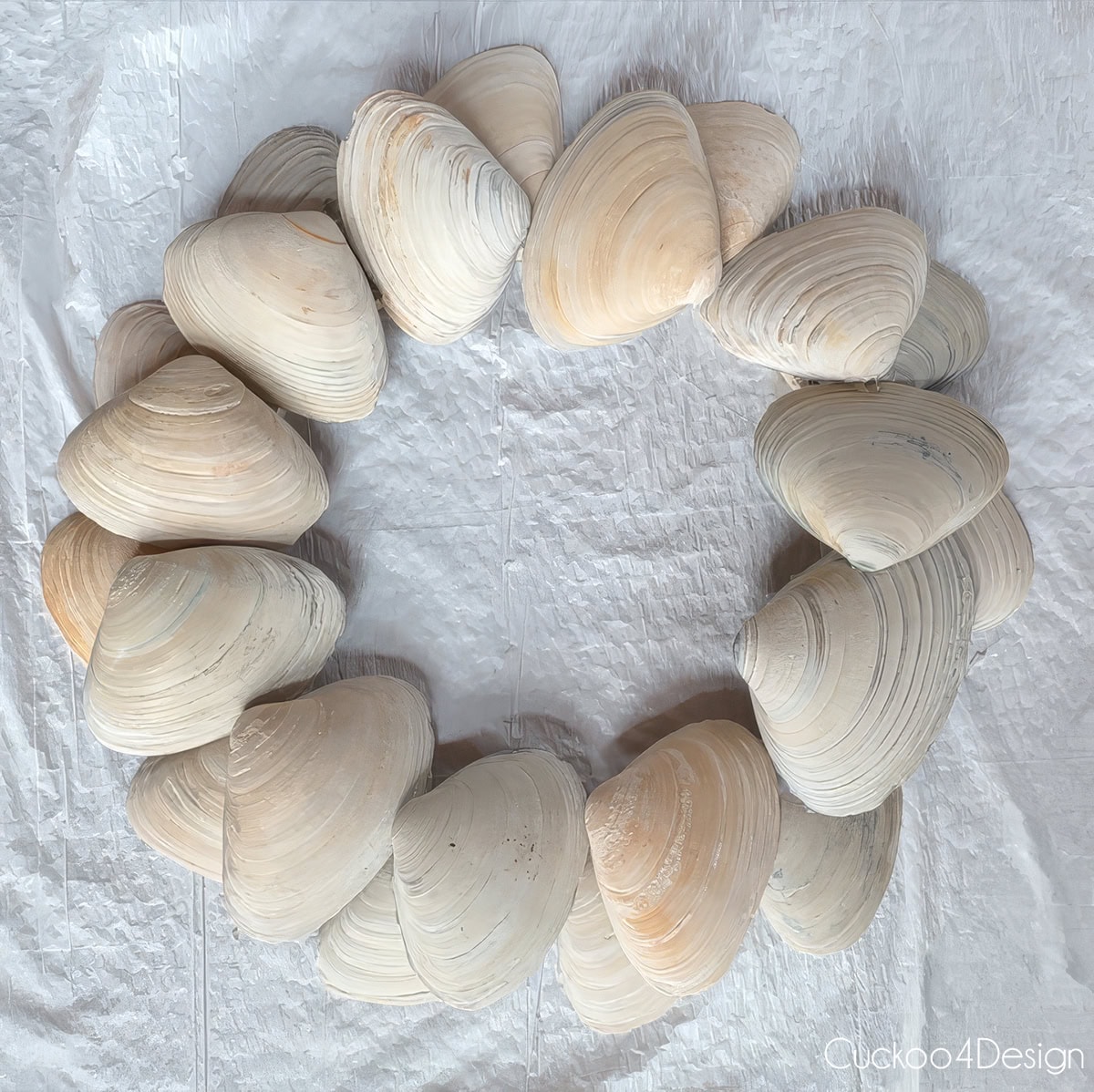 laying out the second row of clamshells on the top of the first layer of shells