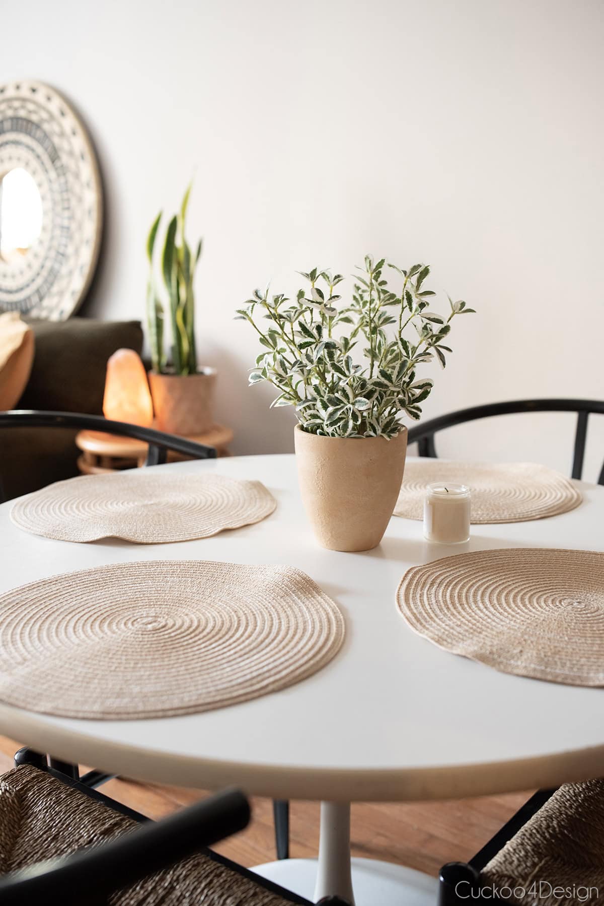 close-up of vintage metal pedestal dining room table in college apartment
