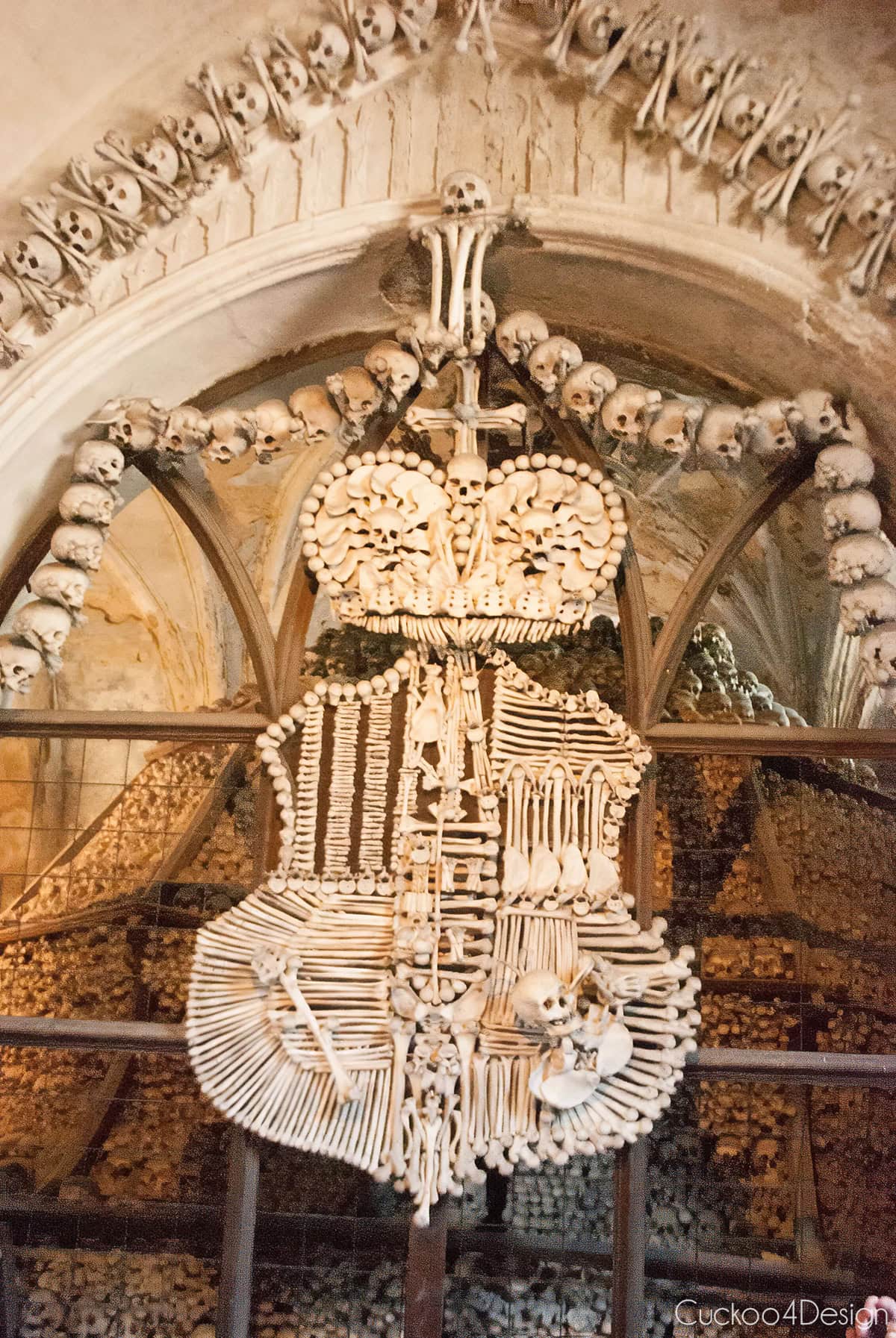 Schwarzenberg coat of arms made of bones and skulls, topped with a crown, in the Sedlec Ossuary